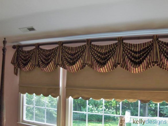 Silk Red And Gold Lined Empire Valance Pole Mounted Over Beige Block Out Roller Shades by kellydesigns