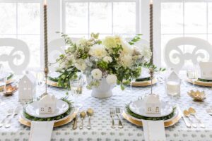 Elegant Winter Table Setting With White Florals and Soft Candlelight